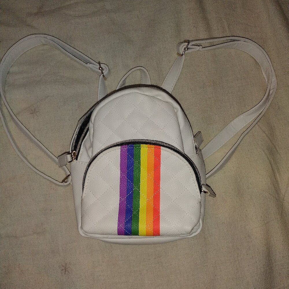 Claires small white faux leather backpack with rainbow design